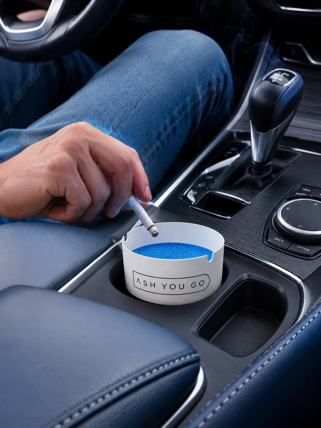 ASH YOU GO tray sitting in a car cupholder